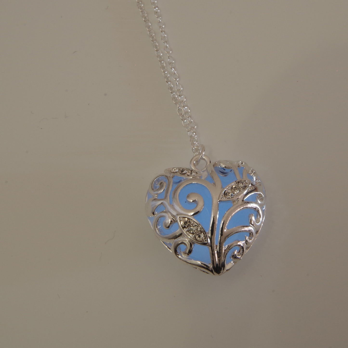 Blue glowing heart necklace Glowing heart of winter jewelry blue heart glow in the dark Pendant Frozen heart Mothers day gift for mom