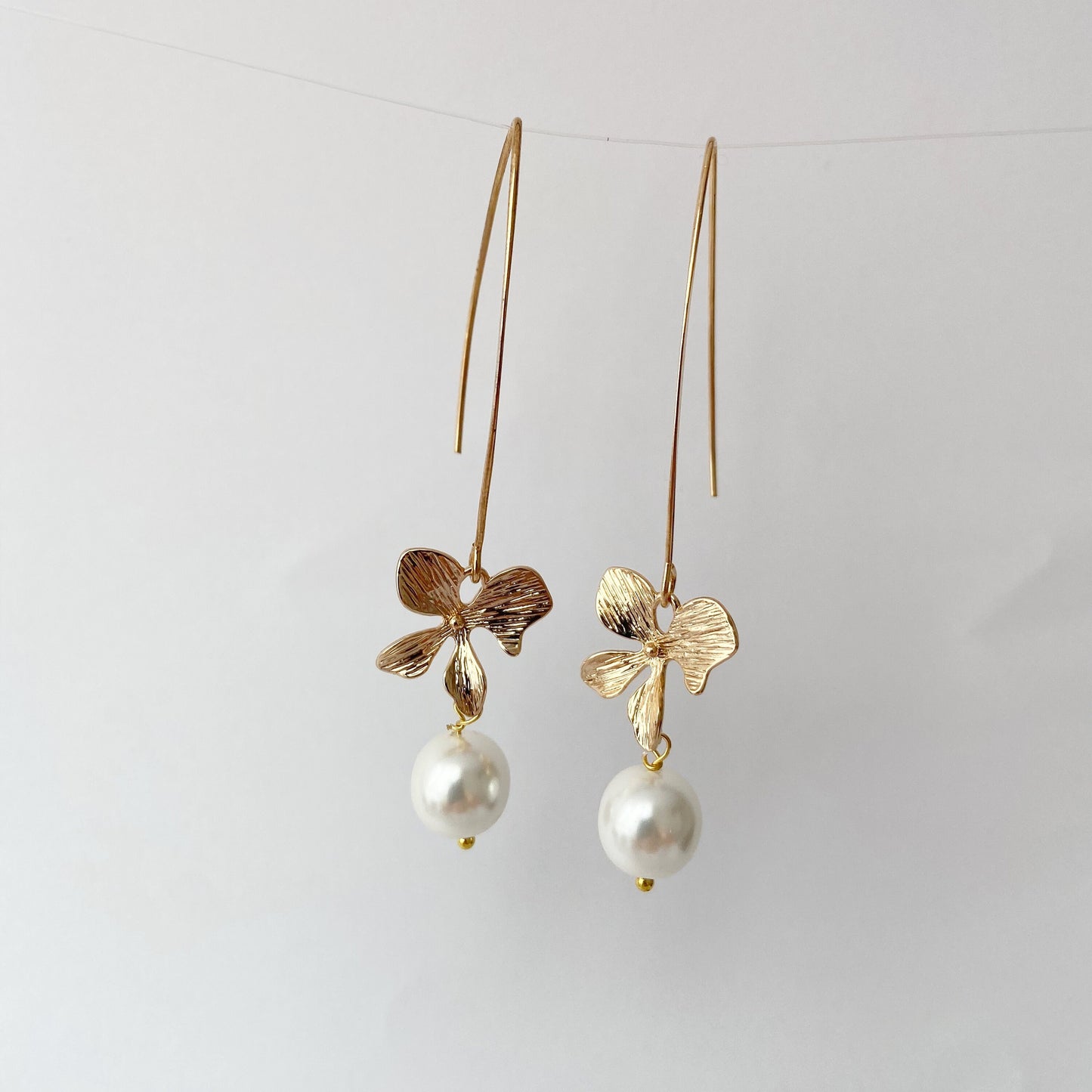 Gold orchid earrings Pearl long dangle flower earrings Floral Bridal jewelry Ivory cream pearl wedding earrings
