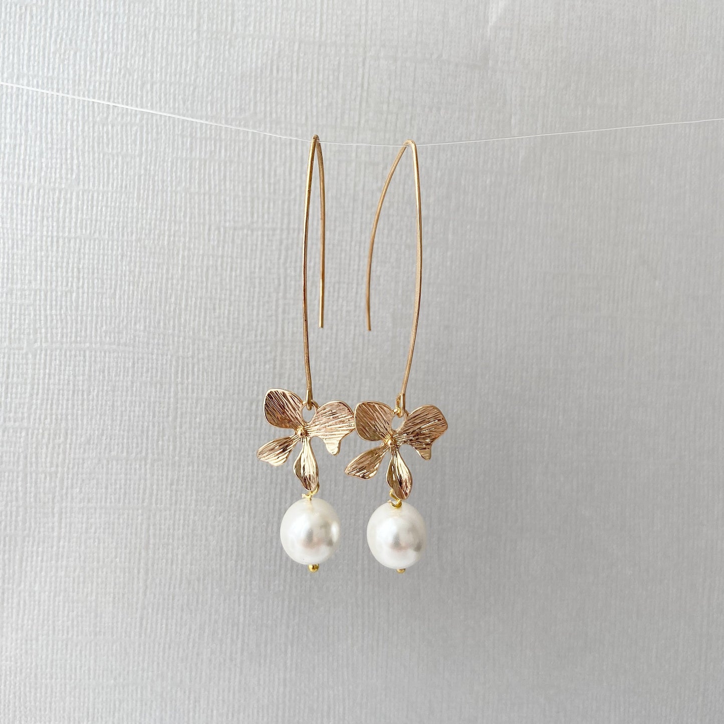 Gold orchid earrings Pearl long dangle flower earrings Floral Bridal jewelry Ivory cream pearl wedding earrings