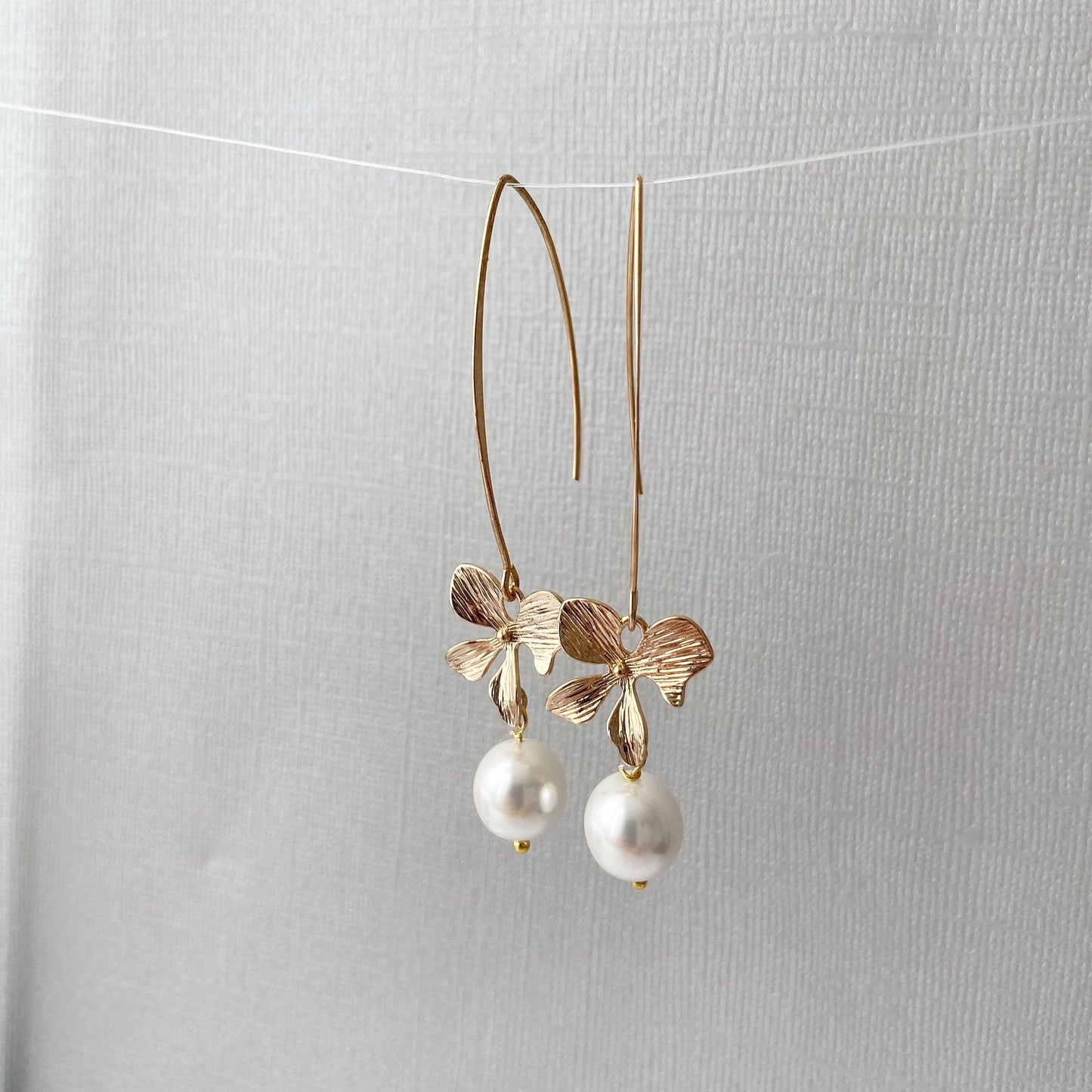 Gold orchid earrings Pearl long dangle flower earrings Floral Bridal jewelry Ivory cream pearl wedding earrings