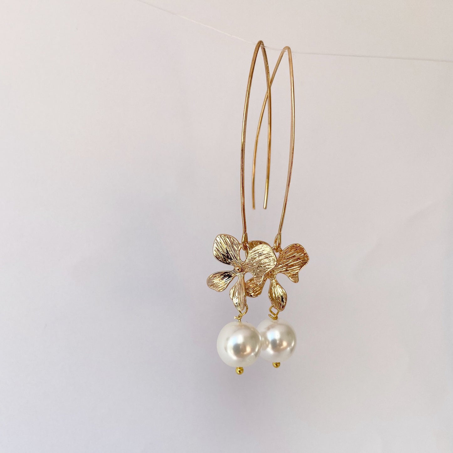 Gold orchid earrings Pearl long dangle flower earrings Floral Bridal jewelry Ivory cream pearl wedding earrings