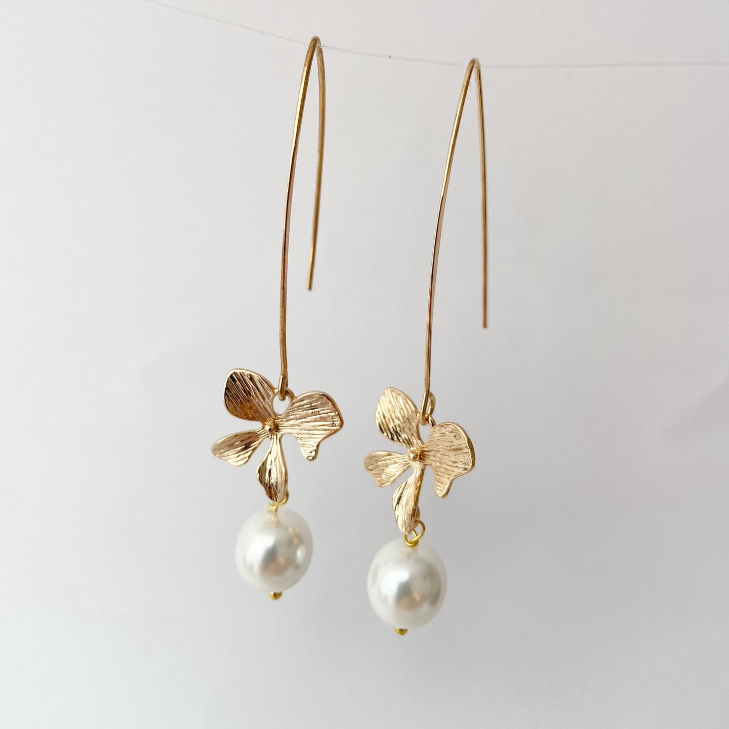 Gold orchid earrings Pearl long dangle flower earrings Floral Bridal jewelry Ivory cream pearl wedding earrings