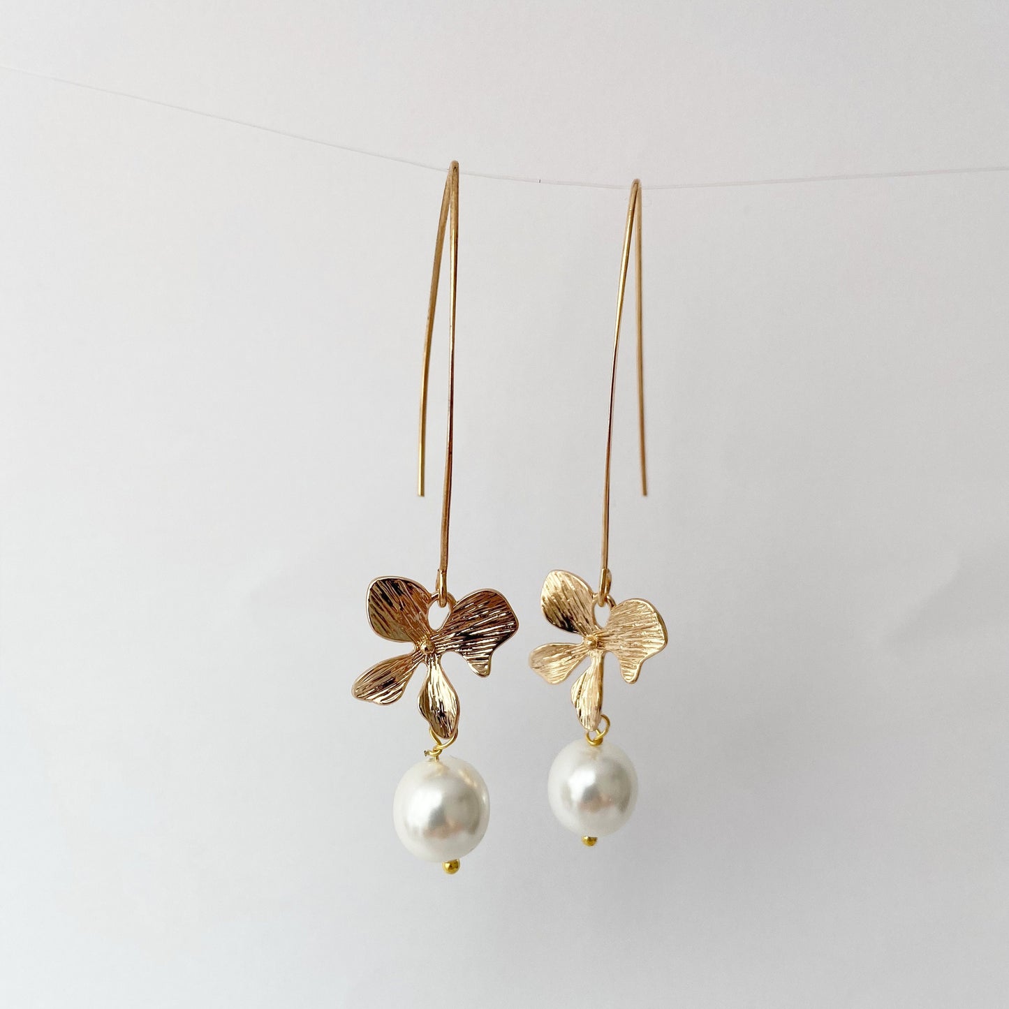 Gold orchid earrings Pearl long dangle flower earrings Floral Bridal jewelry Ivory cream pearl wedding earrings