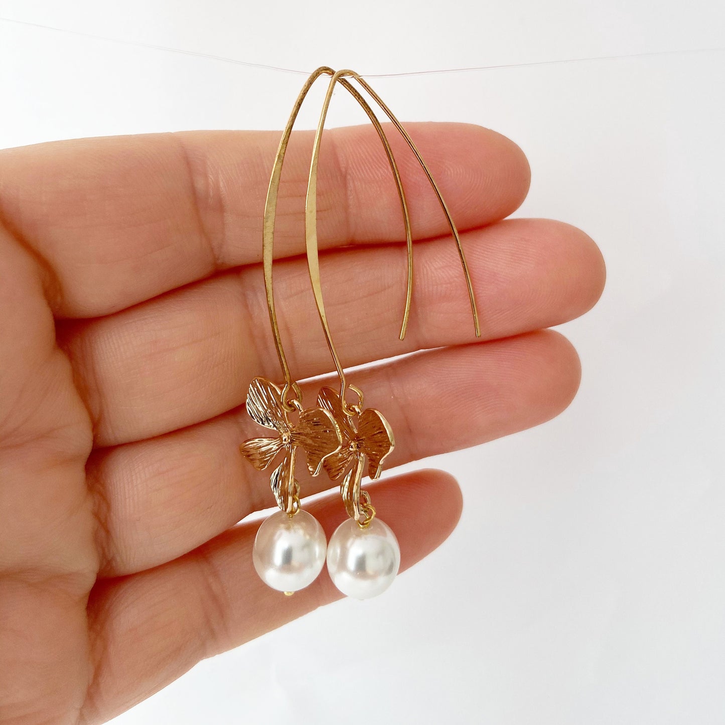 Gold orchid earrings Pearl long dangle flower earrings Floral Bridal jewelry Ivory cream pearl wedding earrings