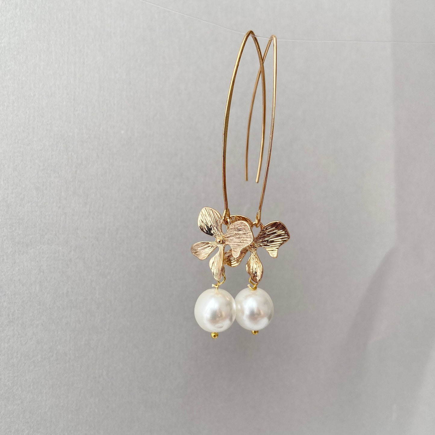 Gold orchid earrings Pearl long dangle flower earrings Floral Bridal jewelry Ivory cream pearl wedding earrings