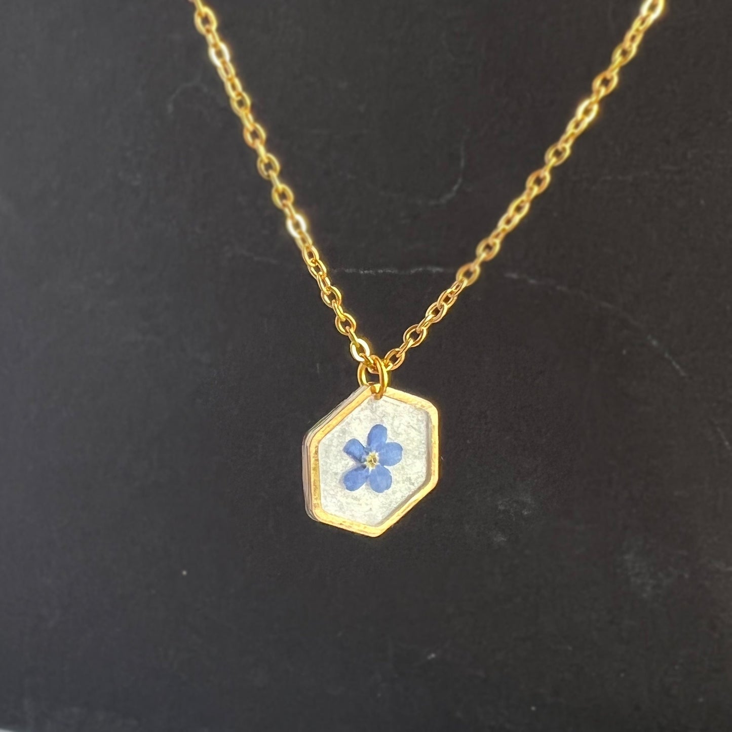 Small blue forget-me-not flower in resin necklace for women flower in hexagonal gold pendants Minimalist jewelry gifts for her