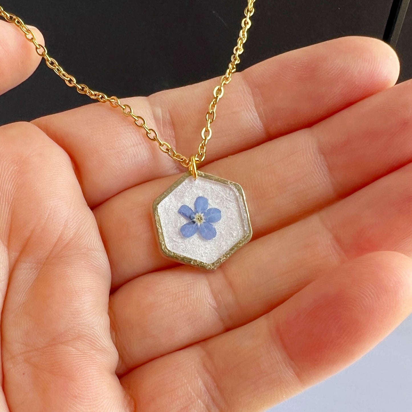 Small blue forget-me-not flower in resin necklace for women flower in hexagonal gold pendants Minimalist jewelry gifts for her