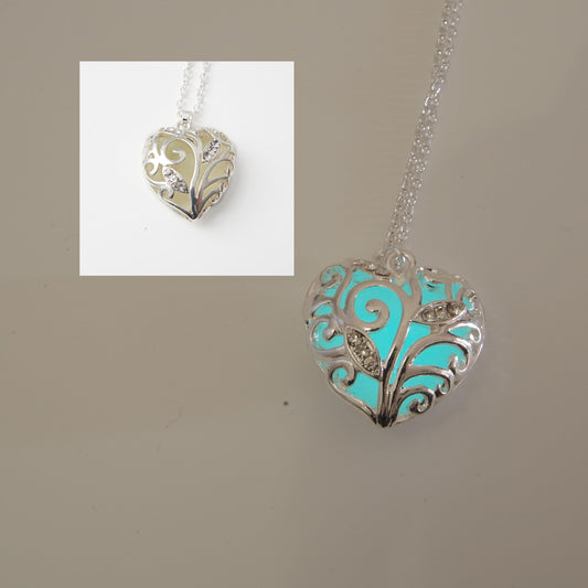 Small blue glowing heart necklace Glowing heart of winter jewelry blue heart  glow in the dark Pendant Frozen heart necklace Christmas gift