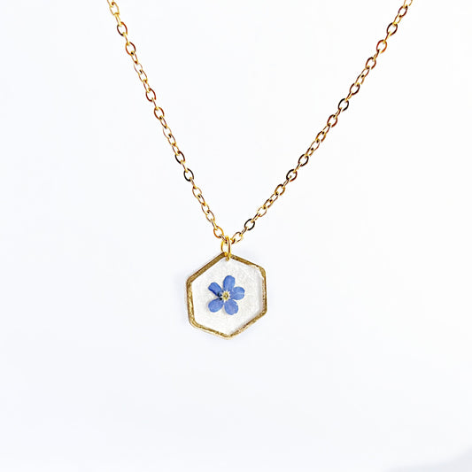 Small blue forget-me-not flower in resin necklace for women  flower in hexagonal gold pendants Minimalist jewelry gifts for her